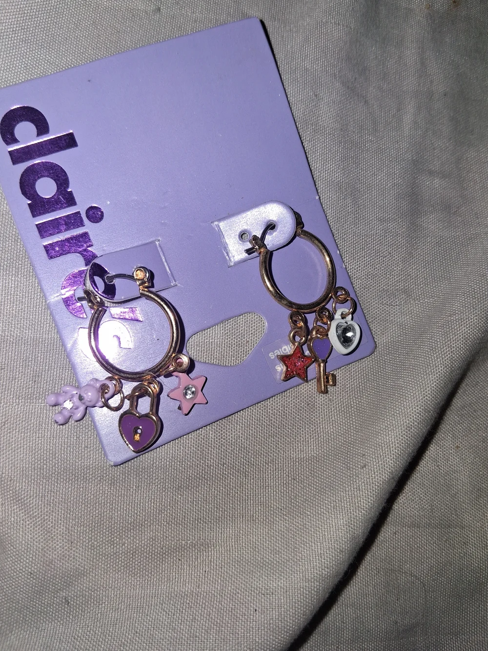 Claire's Rose Gold Hoop Earrings with Pink & Purple Charms